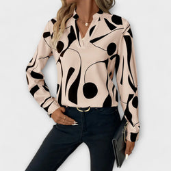 Elegant långärmad blus med spetsig halsringning