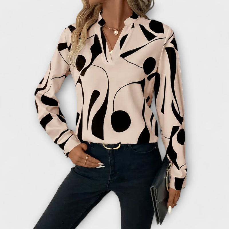 Elegant långärmad blus med spetsig halsringning