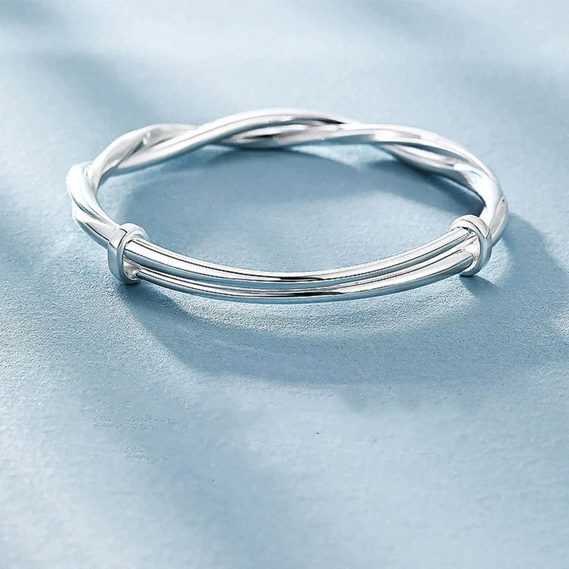 Flätat silverarmband