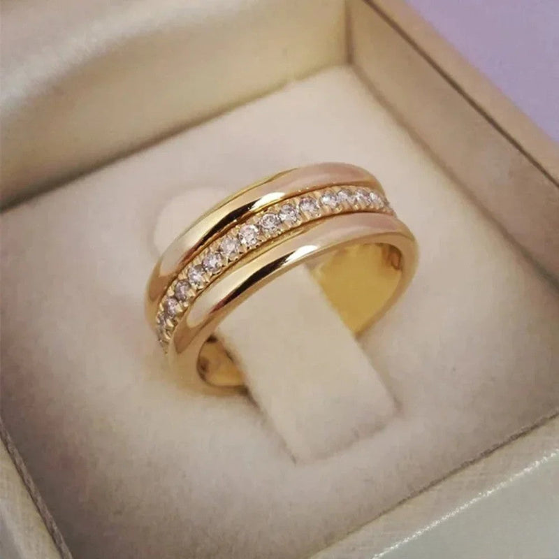 Elegant dubbelring med zirkonia-besättning