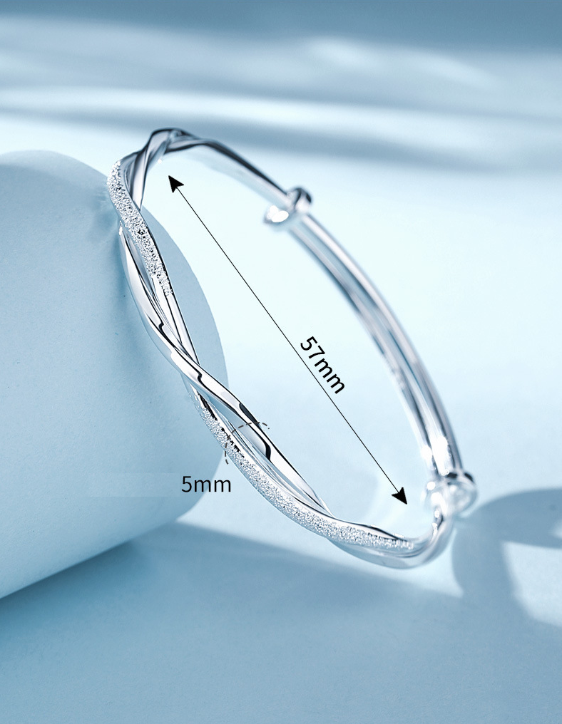 Flätat silverarmband