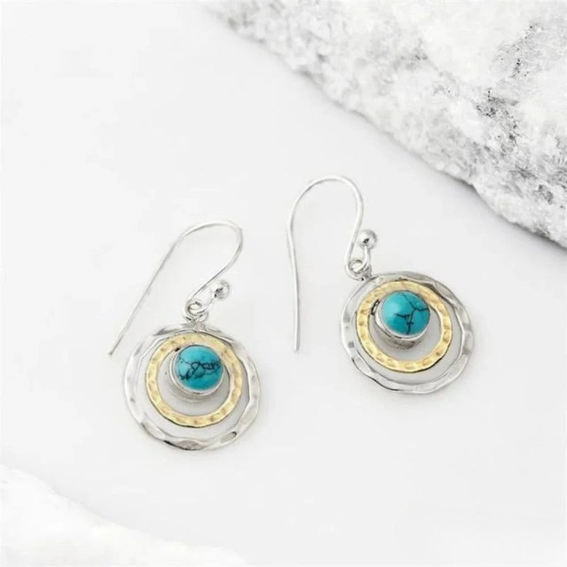 Boho Saturn örhängen med turkos sten i silver & guld