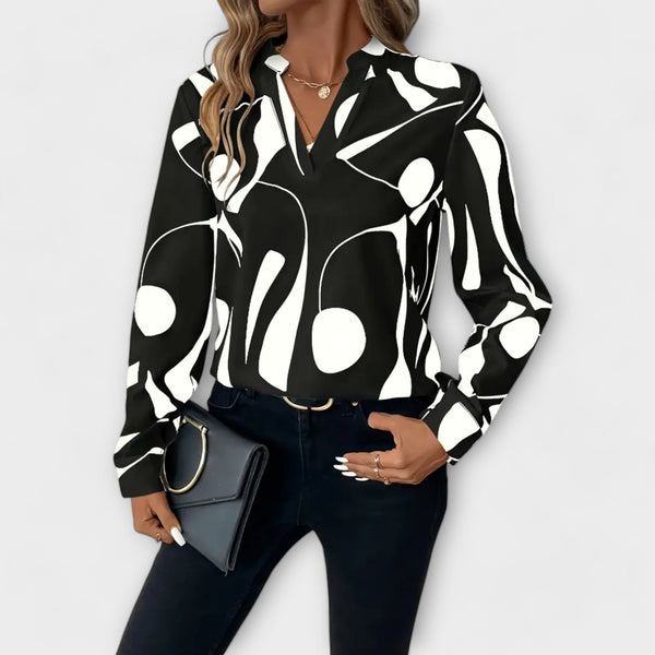 Elegant långärmad blus med spetsig halsringning