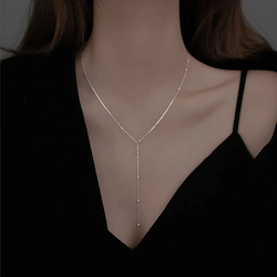 Nyckelben-halsband med fransar