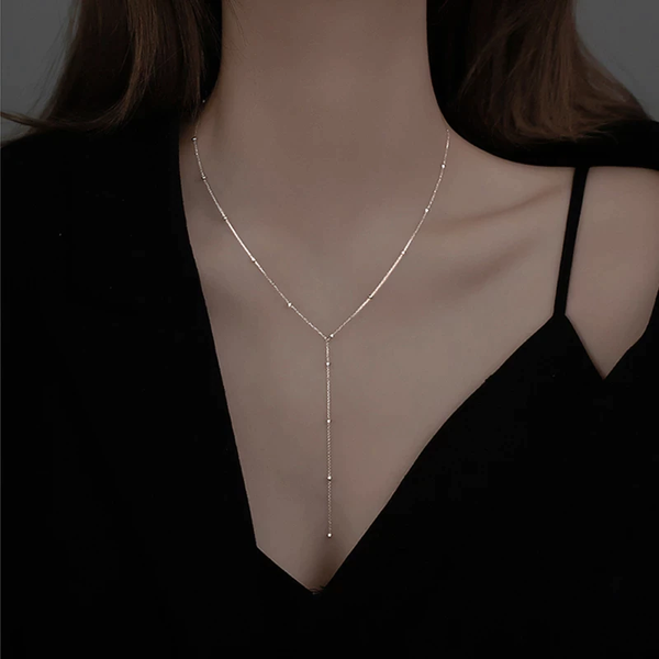 Nyckelben-halsband med fransar